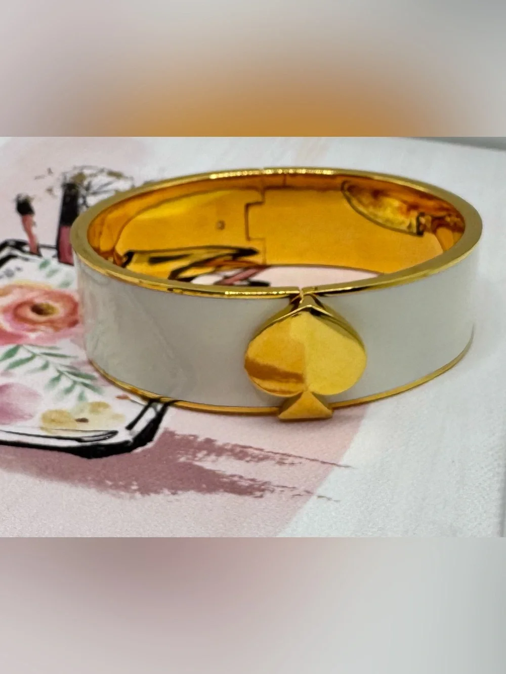kate spade Heritage Spade Wide Enamel Bangle in Off White with Gold Accents - Picture 1 of 9